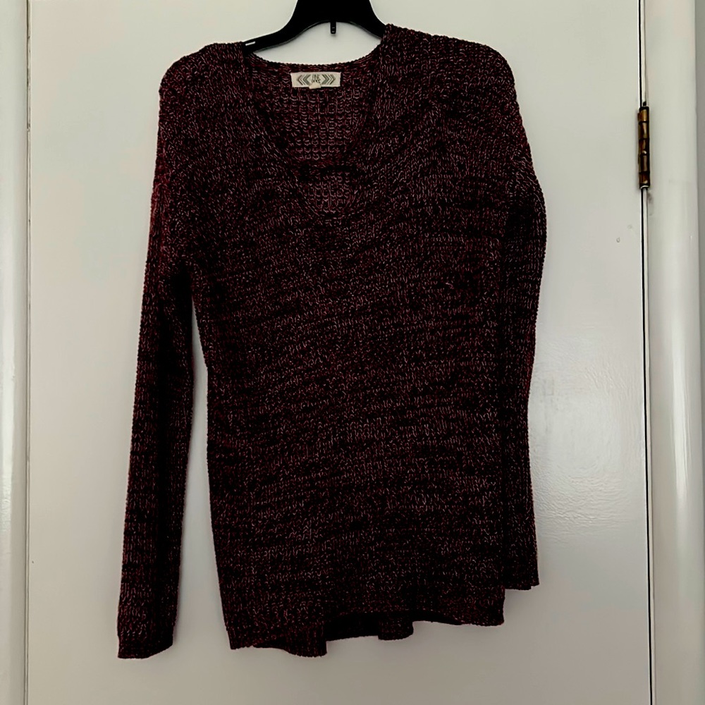 Sweater with cross cross detail